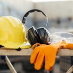 front-view-protective-glasses-with-hard-hat-headphones-min